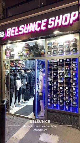 Devanture de Belsunce Shop la nuit, enseigne néon rouge, 3 rue Nationale à Marseille